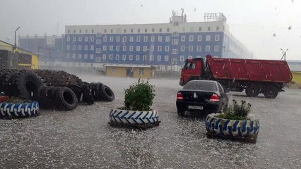 Huge Hailstorm Pummels Parked Car