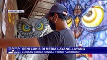 Keren! Seniman Asal Bali Ini Gunakan Media Layang-Layang untuk Melukis
