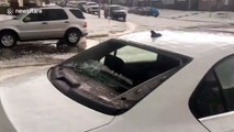 Tennis-ball sized hail storm smashes car window in Calgary, Canada