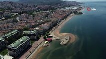 Mudanya sahilinde deniz turuncuya boyandı