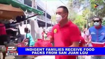 Indigent families receive food packs from San Juan LGU