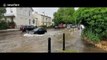 Flash floods cause traffic jams in Cheltenham, South West England