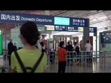 Beijing cuts flights to contain new virus outbreak