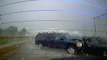 Police officer narrowly escapes scary crash on rainy highway