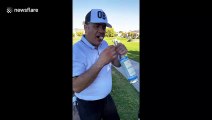 Golfer scores hole in one by uncorking bottle of booze with teeth