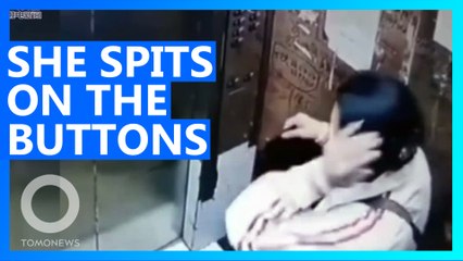 Chinese Woman Caught Spitting on Elevator Buttons