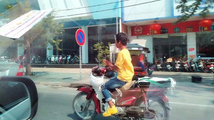 Motorcycle Rider Hand Dances While Listening To Music