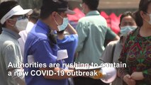 Beijing continues mass testing residents for COVID-19