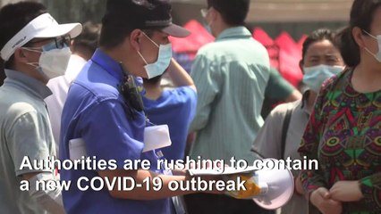 Beijing continues mass testing residents for COVID-19