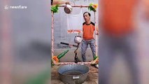 This Chinese electrician is back with more incredible balancing skills