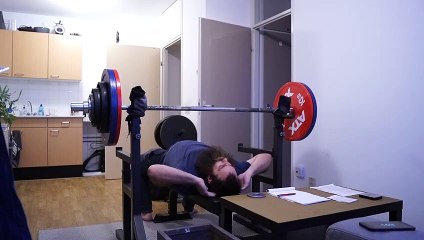 138,5 kilogram RAW bench press with around a 71,5 cm spaced grip