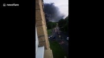 Plumes of smoke seen from derelict building explosion in UK