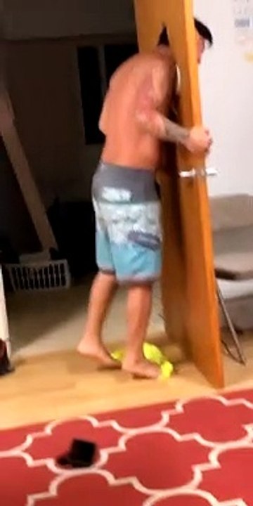 Head Embedded in Door After Headbutt
