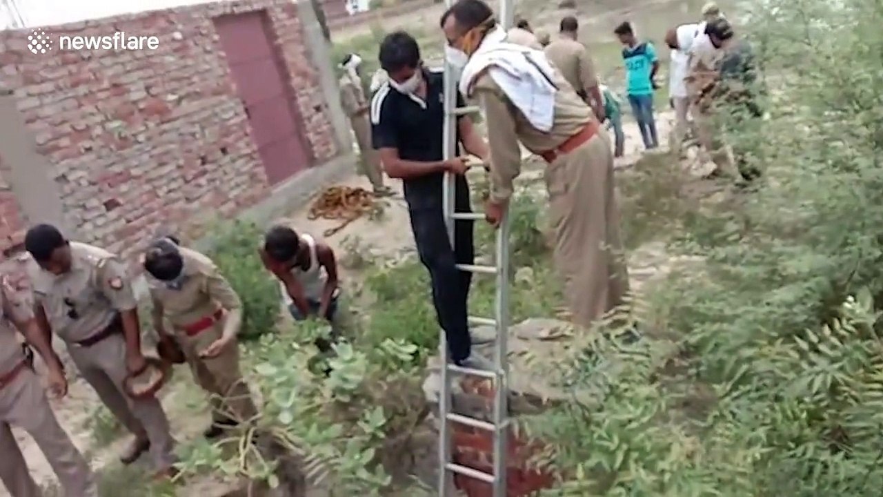 Officials rescue elderly woman who jumped into 60-feet-deep well in northern India
