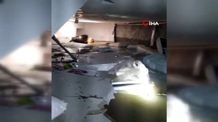 Su basan mağazanın bodrumundaki kadını dalgıç polis kurtardı