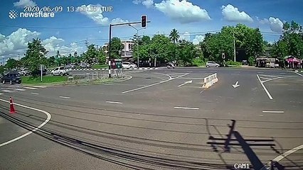 Pickup truck careers through red light before crashing into six parked cars