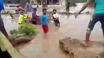 Stranded villagers rescued after check dam overflows in western India