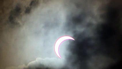 Partial solar eclipse seen from Hong Kong's harbour