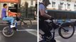 Un policier tente une roue arrière sur son vélo