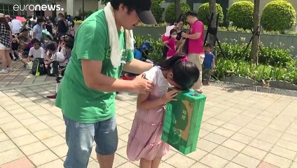 Skywatchers wowed by rare 'ring of fire' eclipse