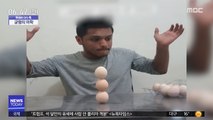 [이슈톡] 맨손으로 계란 3개 세우기 성공 한 남성 화제