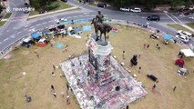 Armed off-duty cop arrested outside occupied Robert E Lee monument in Virginia