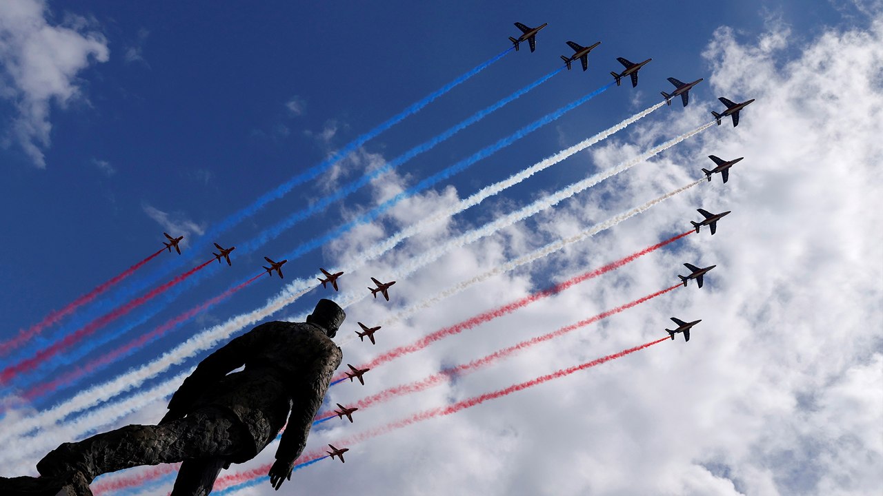 Red Arrows and La Patrouille de France perform flypast over Paris