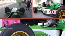 Supercar-Blondie jagt einen Formel-1-Wagen über Dubais Rennstrecke