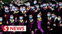 Chinese university holds social distancing-style graduation ceremony