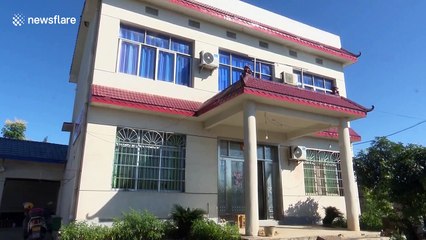 Firefighters remove snake that laid eggs in household's washing machine in China