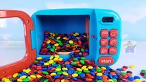 CANDY MandMS MICROWAVE PLAYSET SQUISHY BALLS AND TOY CARS _ LEARN COLORS VIDEO