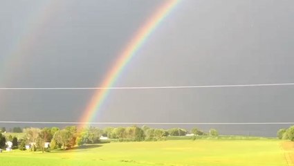 Double rainbow arches above Wisconsin after storm