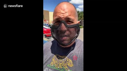 Download Video: Man wears a mesh face mask to prove mandatory masks in Florida is not about protection but compliance