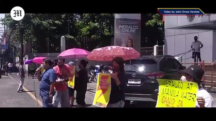 WATCH: Bayan Muna party-list hold a protest outside a Meralco office in EDSa, Kamuning