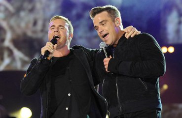 Back For Good? Robbie Williams pens new Take That songs