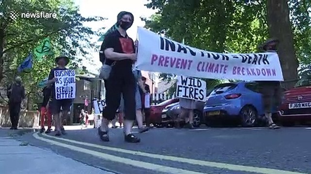 Dozens of climate protesters block traffic in UK on hottest day of the year