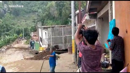 Shocking video catches moment landslide buries mountain road in eastern Indonesia