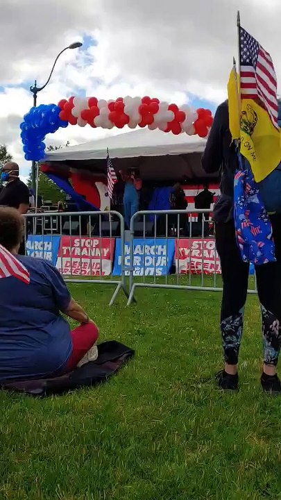 Comedian Sasha Baron Cohen Performs live in Disguise  at the March For Our Rights Rally in Olympia WA