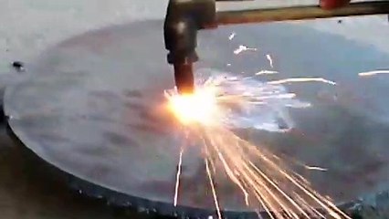 Free hand gas cutting a circle in  5 mm steel plate