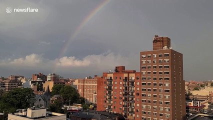 On Pride Day, an impressive double rainbow is seen over New York City skyline