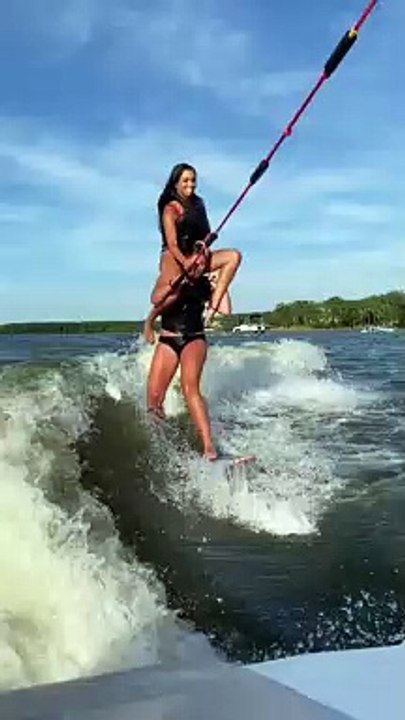 Waterskiing While Perched on Shoulders
