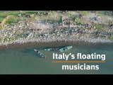Italian musicians perform in fishing boats to beat coronavirus blues
