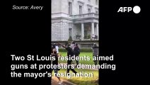 Couple draw guns on St Louis protesters