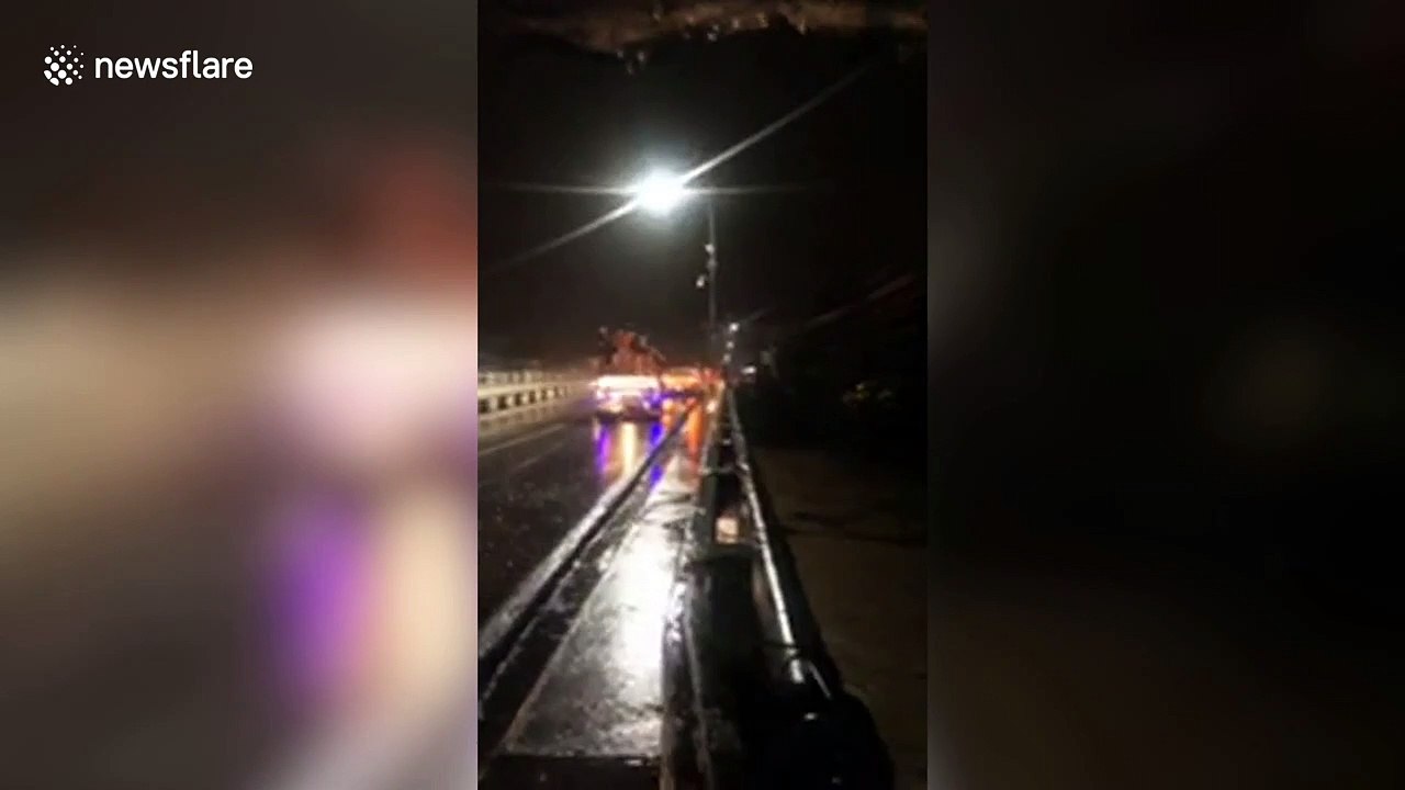 Heavy rain causes swollen river and flash floods in the Philippines