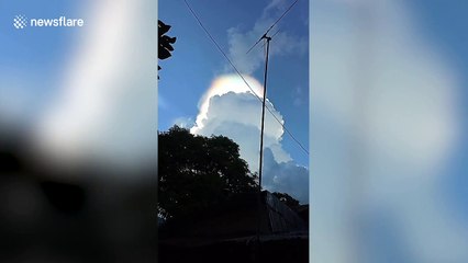 Beautiful rainbow cloud appears after storm in the Philippines