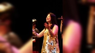 Happy beautiful lead singer, the Top Line Chinese band, Thursday nights, Starlight Casino New Westminster BC, Metro Vancouver, Canada