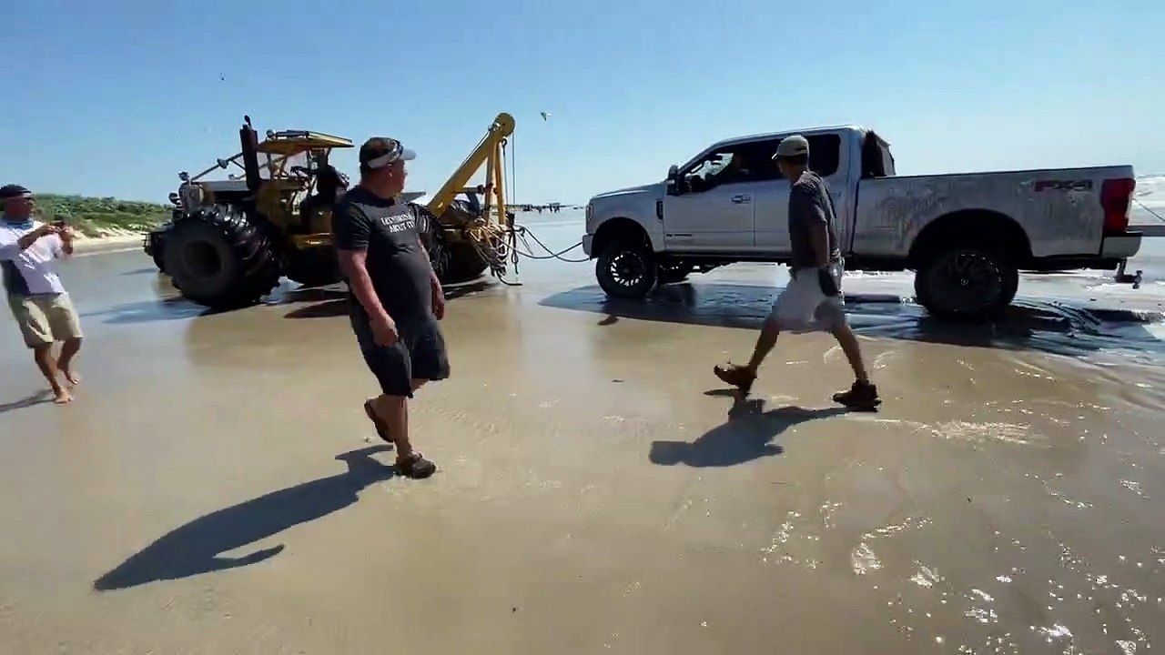 Saving Multiple Vehicles Stuck on the Beach