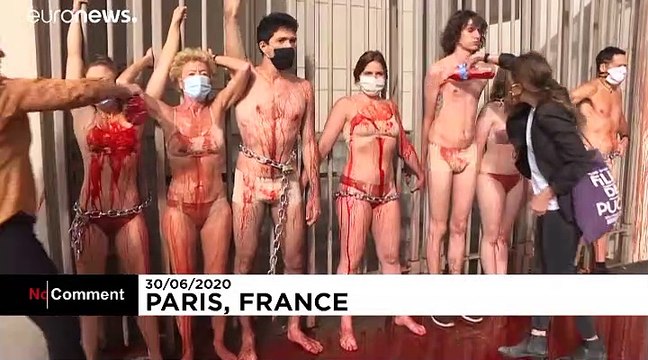 Extinction Rebellion activists chain themselves to gates in French Finance Ministry protest