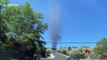 Dust devil swirls after picking up ashes from 'Poeville fire' in Reno