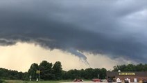 Ominous clouds loom in the distance